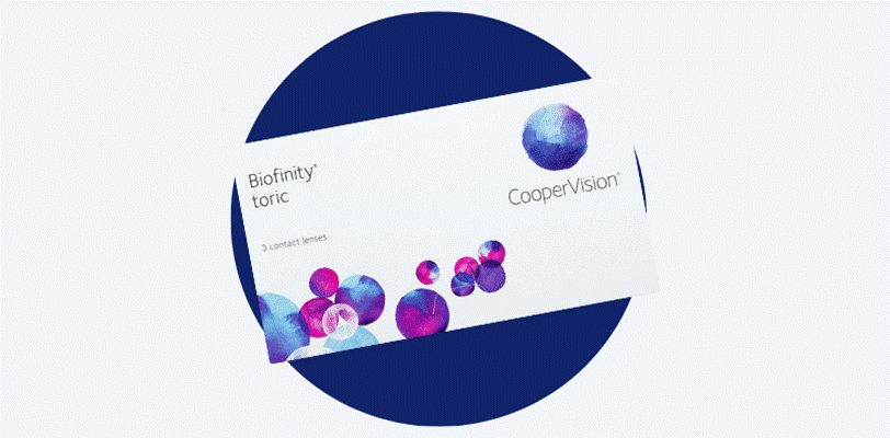 A box of Coopervision Biofinity Toric contact lenses on a blue and grey background.