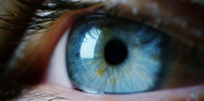 A close-up of a blue eye