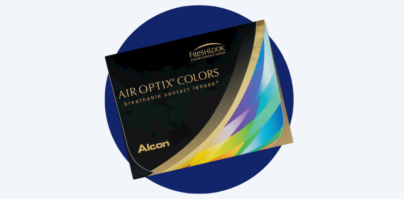 A graphic with a grey background and a blue circle in the centre with a flat lay of the Air Optix® Colors contact lens packaging on top.