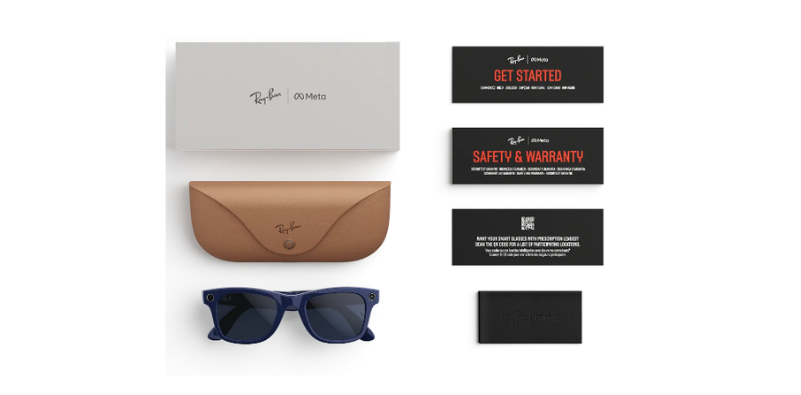 A flat lay image of the contents of a Ray-Ban Meta sunglasses product including charging case, sunglasses, information cards and warranty